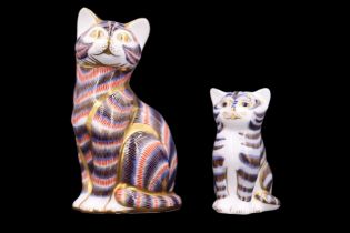 Two Royal Crown Derby cat paperweights, both having silver stoppers, tallest 13 cm