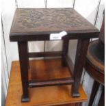 Small square mahogany Arts & Crafts table with carved top 12ins square x 14ins high Joints loose