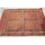 Pakistan carpet of Afghan four panel design with rose ground, 267cms x 186cms approximately