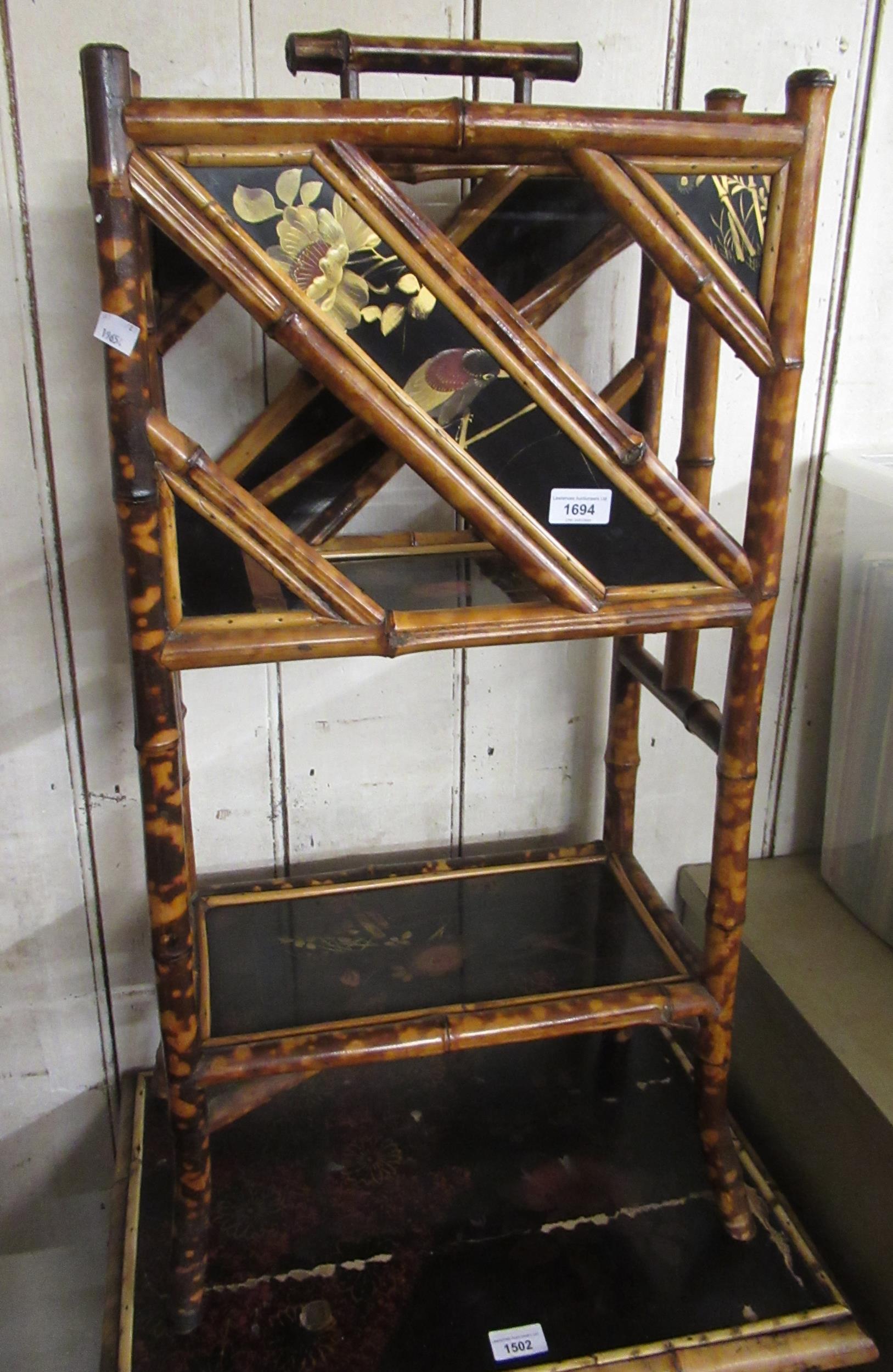 19th Century bamboo and chinoiserie decorated magazine rack with undertier, 85cms high x 45cms