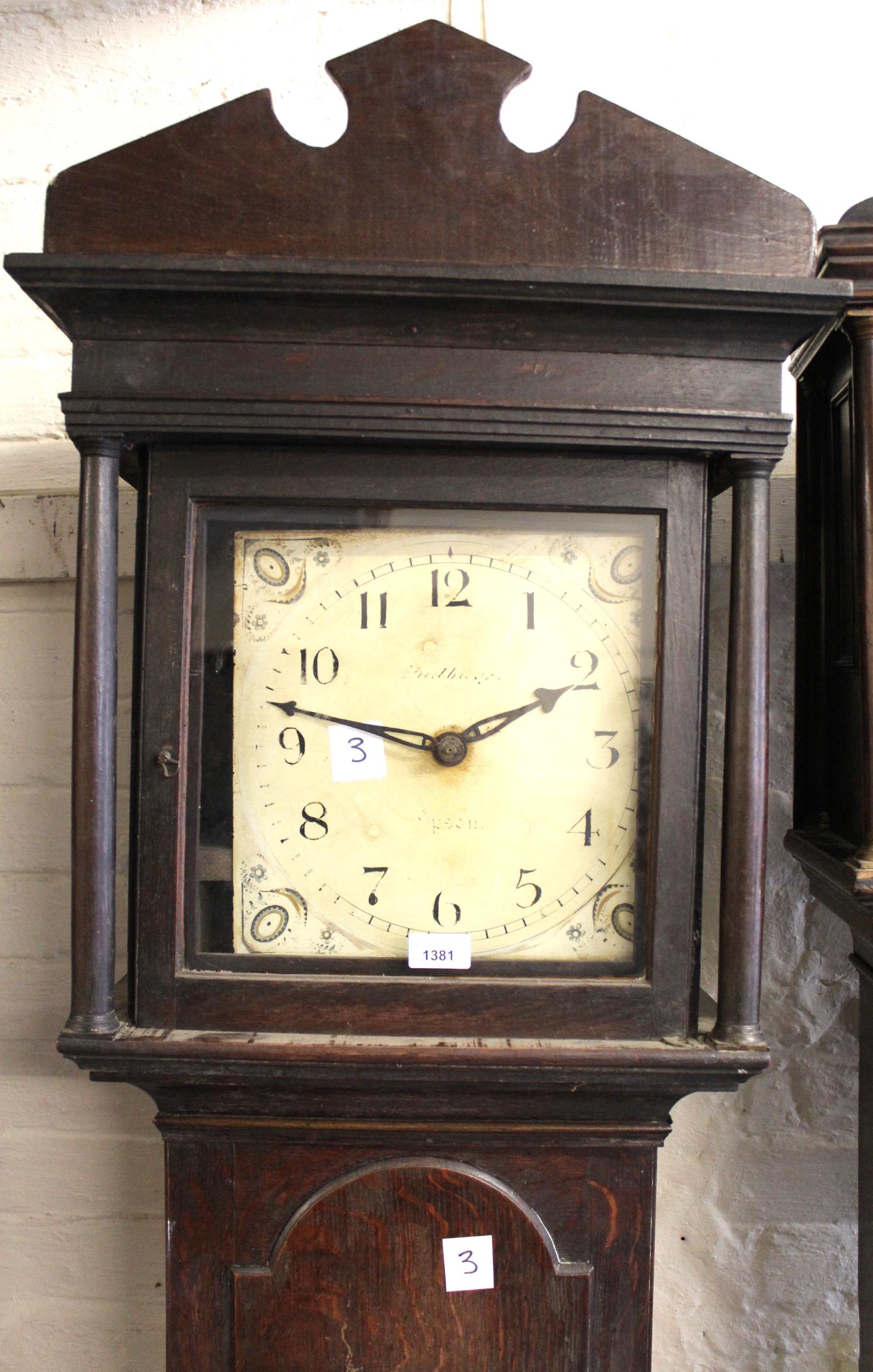 George III oak longcase clock, the square hood enclosing a painted dial with Arabic numerals, with a