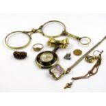 9ct Gold bow clip, pair of gold plated lorgnettes, an antique garnet set ring (at fault), and a