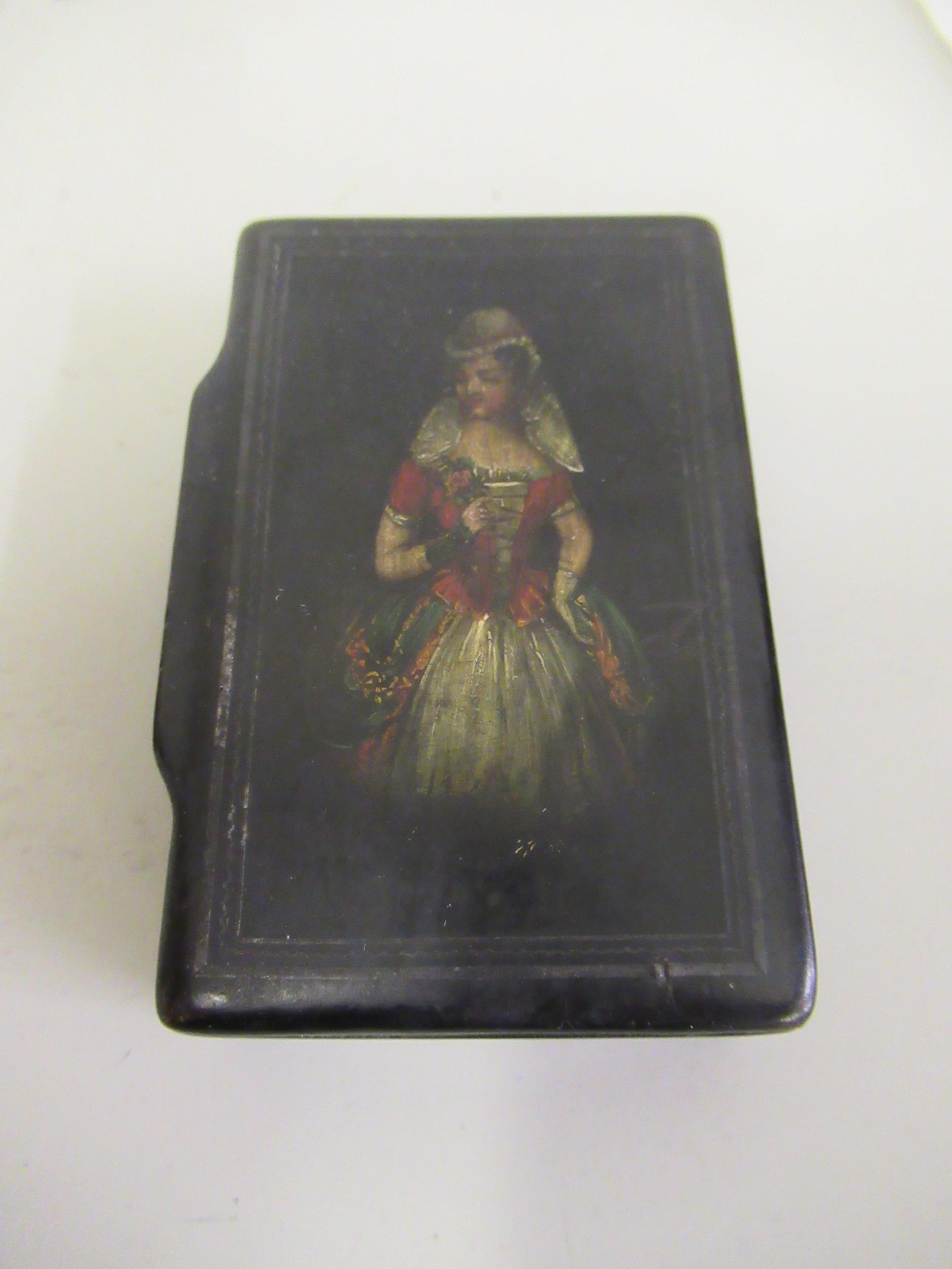 19th Century rectangular papier mache snuffbox, the hinged cover painted with a portrait of a lady