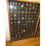 Large oak framed and glazed collection of mounted military badges