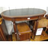 Reproduction oval mahogany leather inset side table, on turned fluted supports, 91cms wide