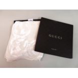 Gucci, cream silk headscarf, in original box In good condition, only one very tiny mark/stain.