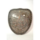 Early 20th Century patinated copper wall plaque decorated with a battle scene in the form of a