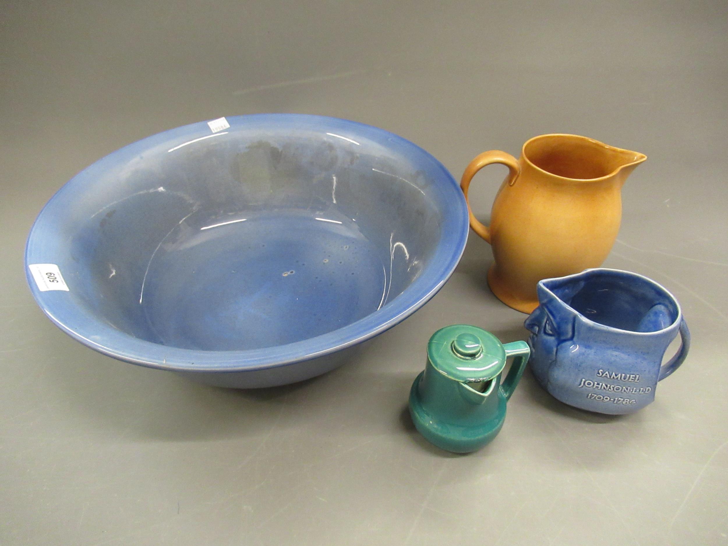 Large Ashtead pottery blue glazed washbowl, (star crack to base), together with a Samuel Johnson jug