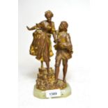 Early 20th Century gilded and patinated spelter group of a young man and lady, after Rancoules,