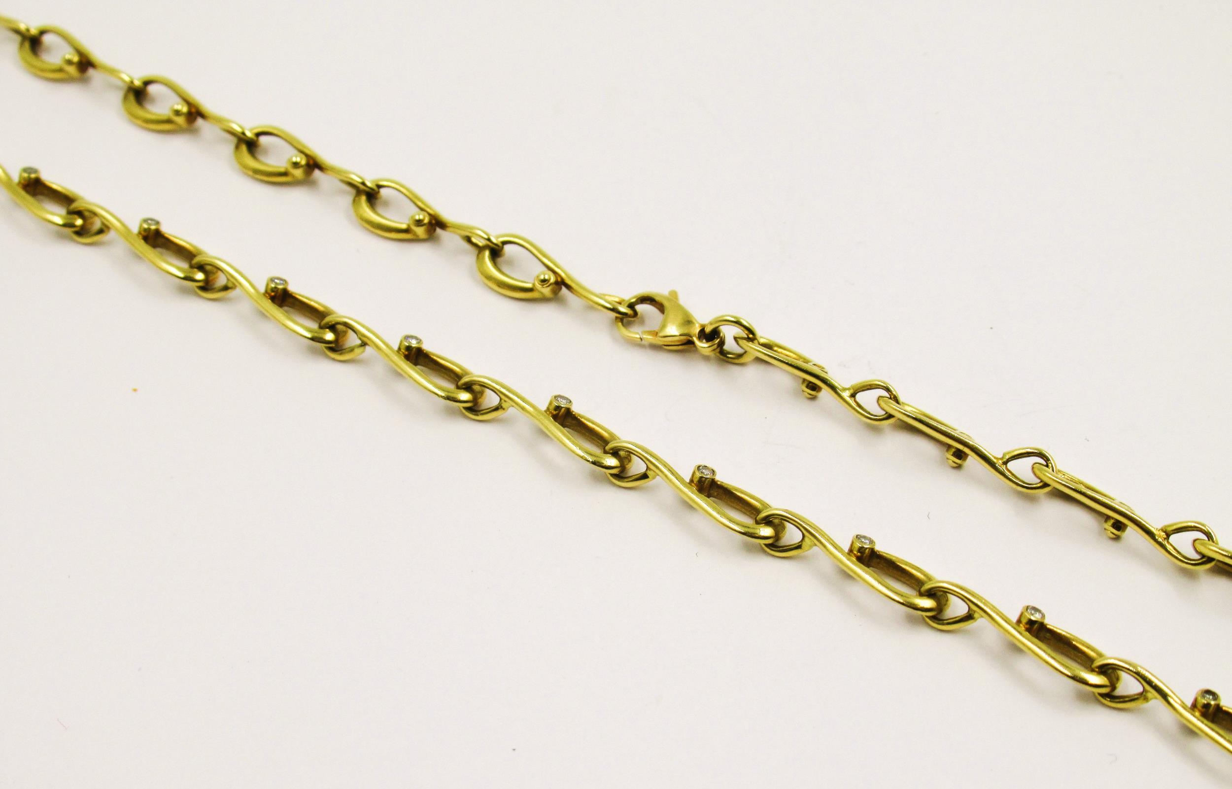 18ct Yellow gold necklace of scroll design, set small diamonds, 25g, 46cms long