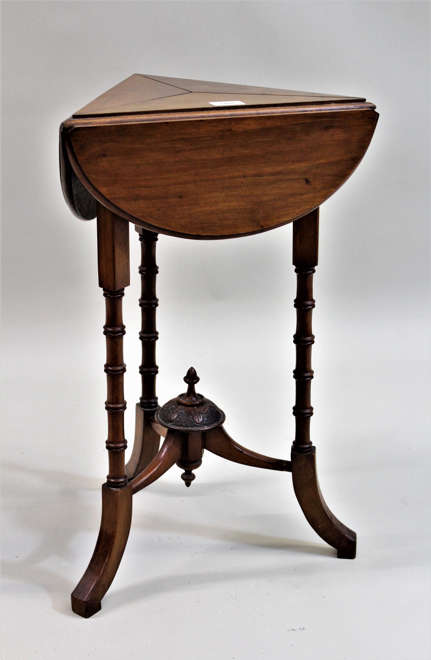 Small late 19th Century / early 20th Century walnut occasional table, the shaped triangular top with