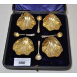 Cased set of four Edwardian silver shell form salts with spoons, London, 1903