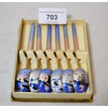 Set of six Norwegian sterling silver gilt and enamel decorated coffee spoons in fitted box These
