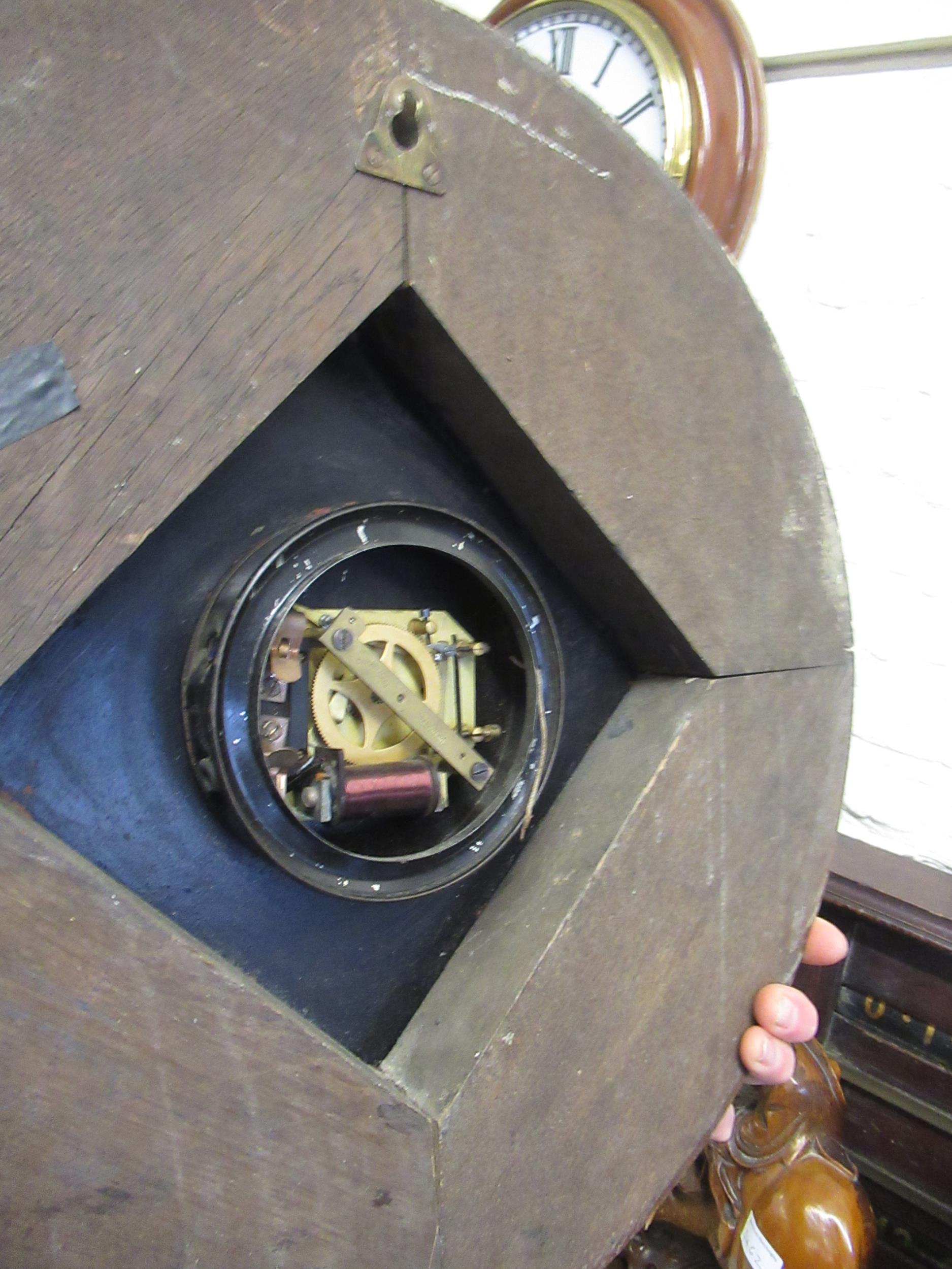 20th Century circular wall clock with metal faux wood frame, the later painted dial inscribed ' - Image 6 of 7