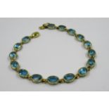 14ct Yellow gold blue stone set bracelet Weight - 6.5g