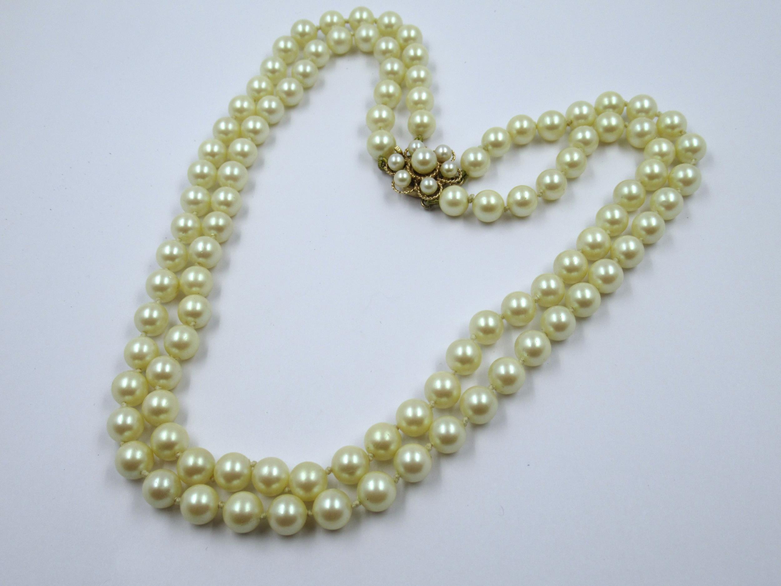 Twin row simulated pearl necklace, with a 9ct gold cultured pearl set clasp