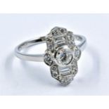 Platinum Art Deco style ring set with baguette and brilliant cut diamonds, .80ct, size 'O'