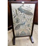 Early 20th Century oak firescreen inset with an Indian silk, metal thread and sequin picture of