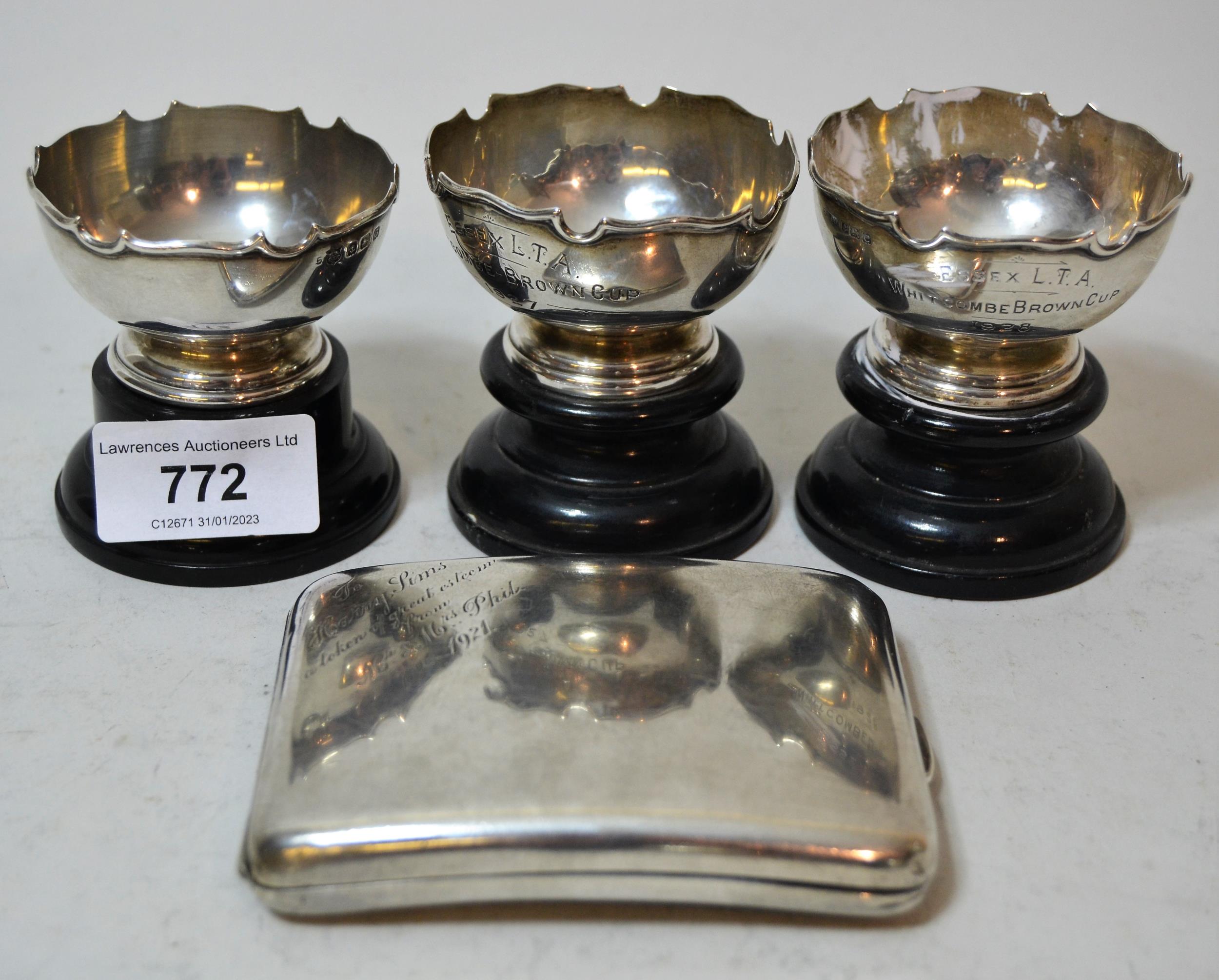 Three small Birmingham silver trophy cups on ebonised plinth bases, together with a Sheffield silver