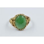 9ct Gold oval green jade set ring, size M Good overall condition. 3.4g in weight. Jade is 12mm x