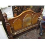 Victorian oak headboard with serpentine shaped top rail and turned finials, 137cms wide