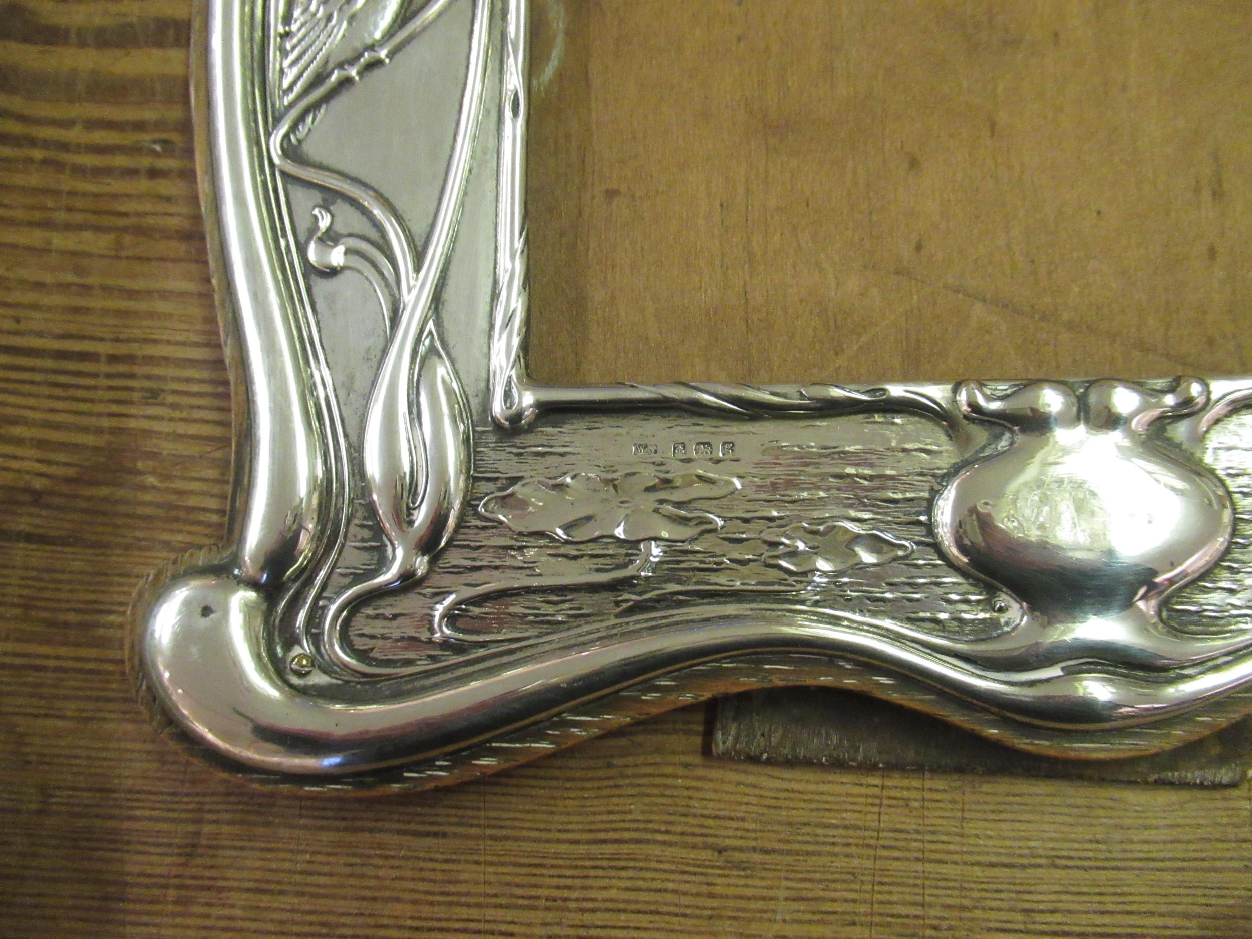 Art Nouveau silver photograph frame, embossed with kingfishers, together with a silver pepper - Image 3 of 6