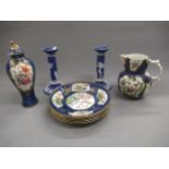 Pair of Wedgwood blue jasperware candlesticks, 20cms high together with a Booths Kakiemon design