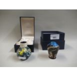 Miniature Moorcroft baluster form vase, 5.5cm high with original box, together with a similar