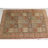 Tabriz rug with an all-over panel design in shades of rose, pale blue and cream, 206cms x 140cms
