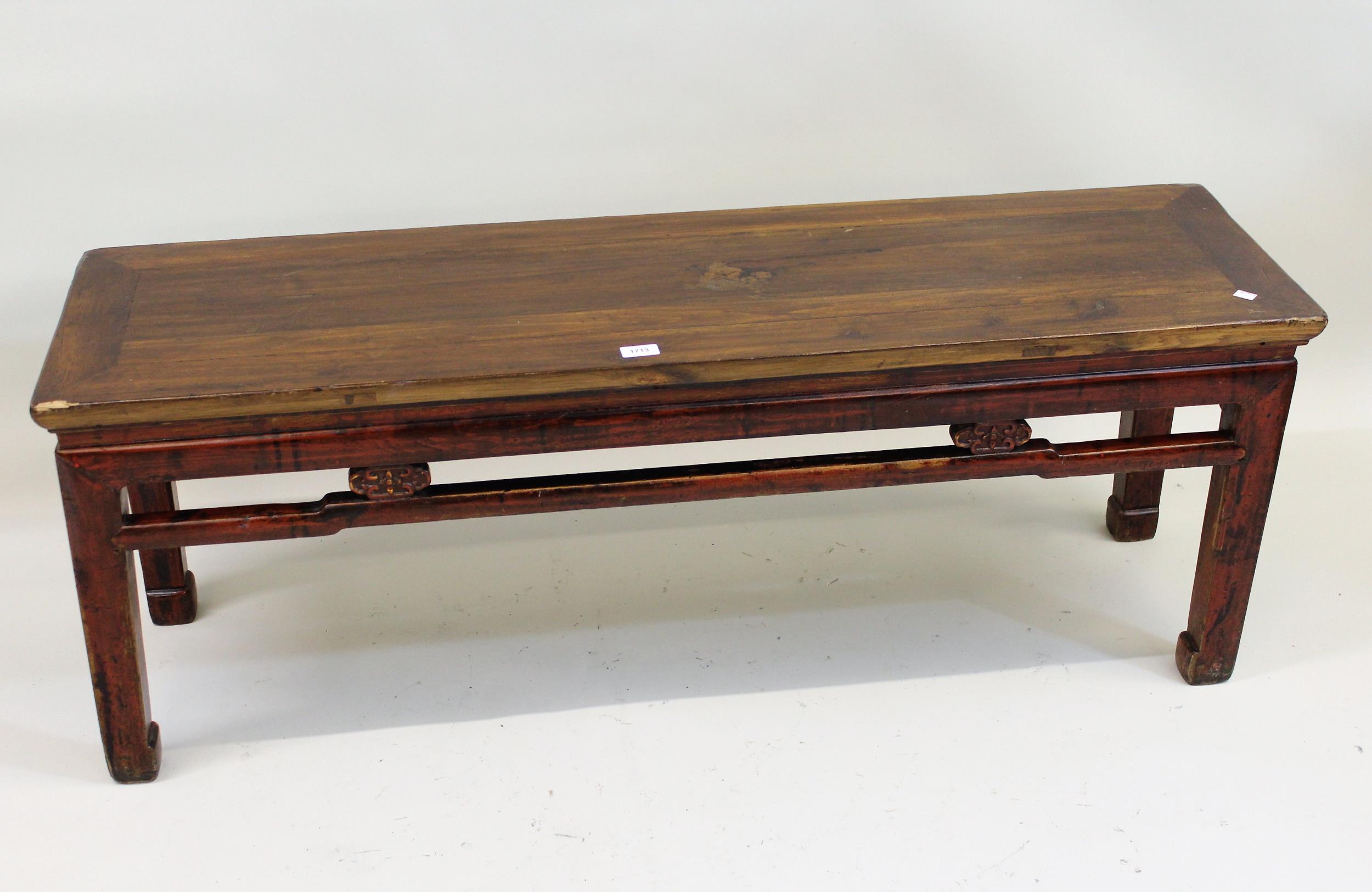 Early 20th Century Chinese rectangular elm bench seat with a pierced frieze, raised on rectangular