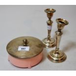 Birmingham silver lidded dressing table powder box and a pair of silver candlesticks, (at fault)