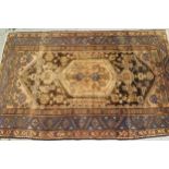 Hamadan rug with a lobed medallion and all-over stylised floral design in shades of rose, beige