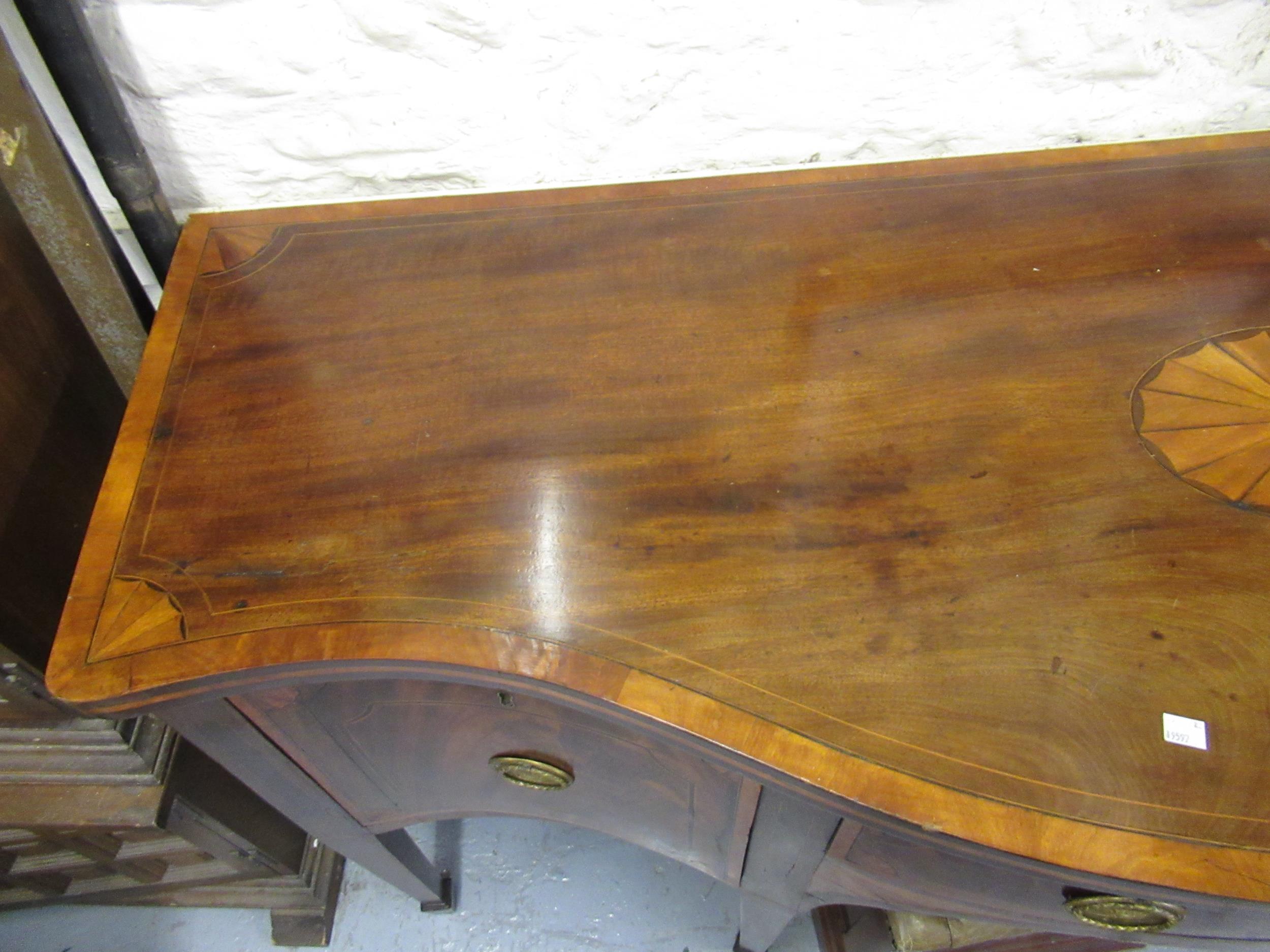 George III mahogany crossbanded and line inlaid serpentine fronted sideboard, with an arrangement of - Image 3 of 5