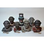 Collection of seven various American cast iron figural money boxes