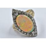 18ct Yellow gold marquise ring set oval opal surrounded by diamonds, the opal approximately 17mm x