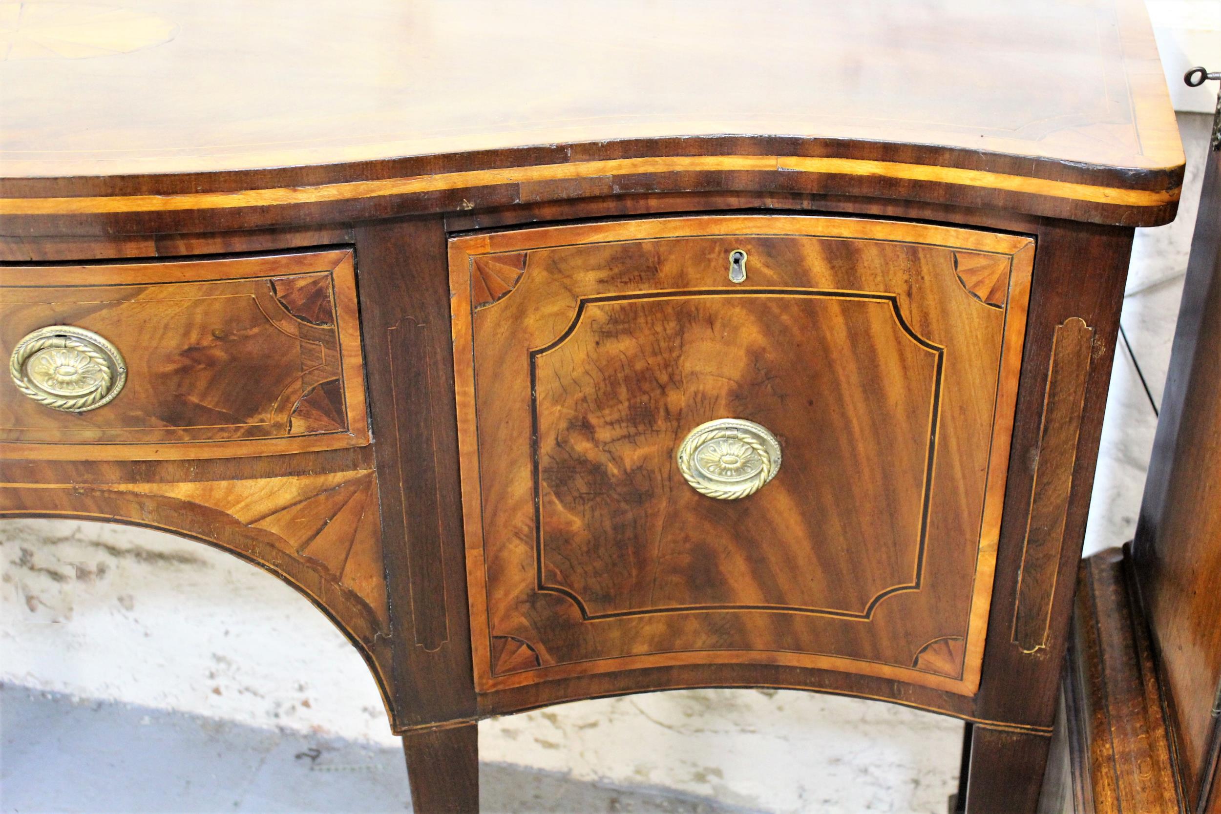 George III mahogany crossbanded and line inlaid serpentine fronted sideboard, with an arrangement of - Image 2 of 5