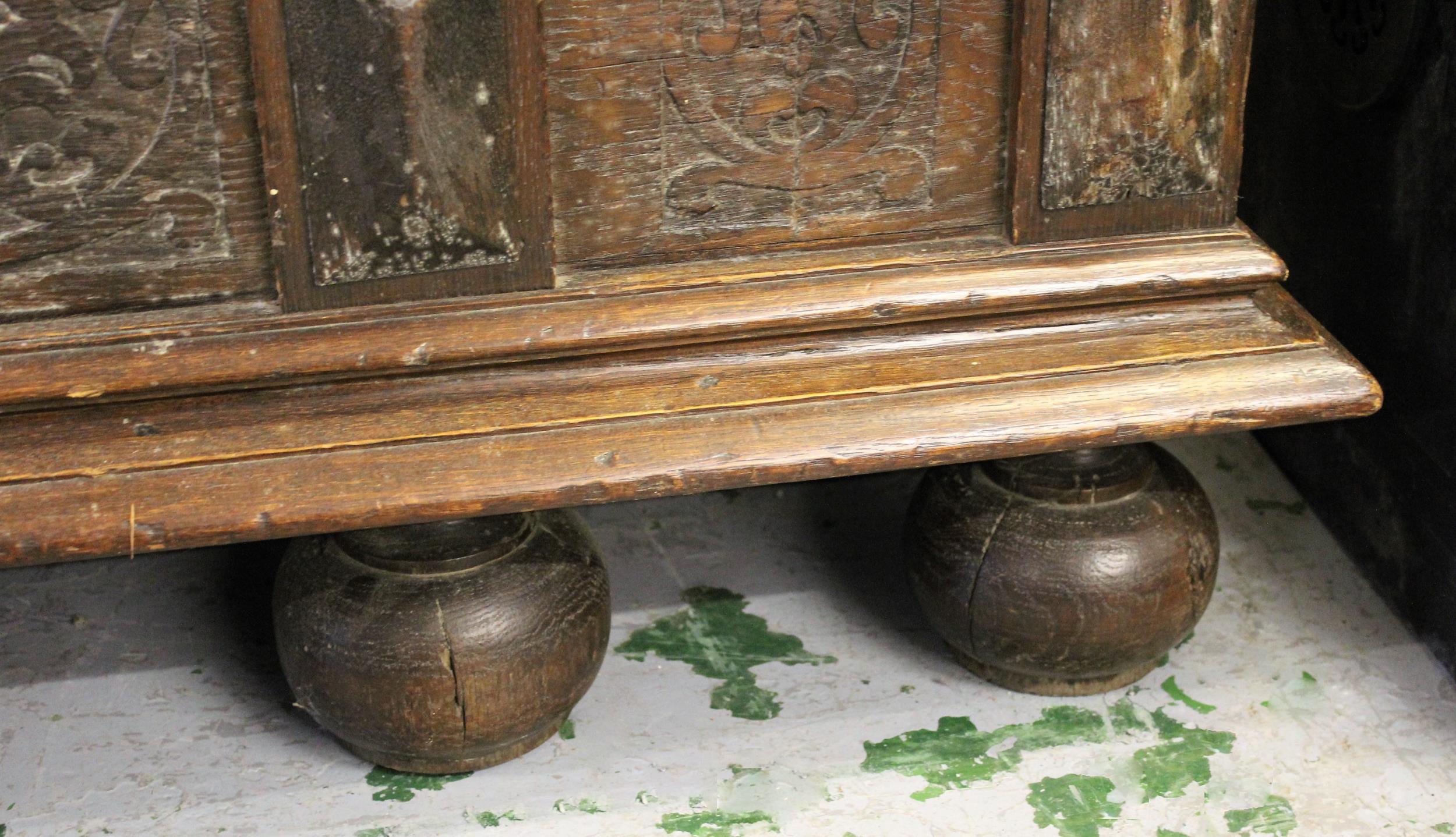 Continental oak armoire, the moulded cornice above a pair of carved fielded panelled doors flanked - Image 4 of 5