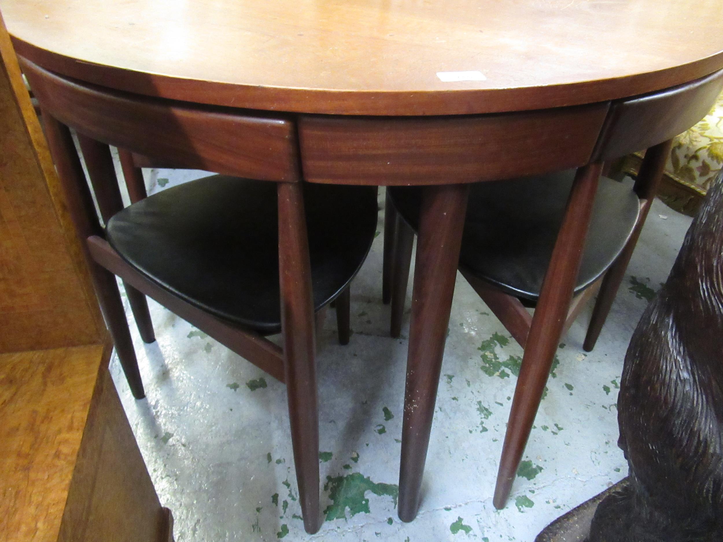 Frem Rojle, Danish teak circular dining table with four integral chairs on turned tapering supports, - Image 7 of 10