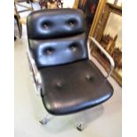 Black leather upholstered and chromium Eames type revolving office chair