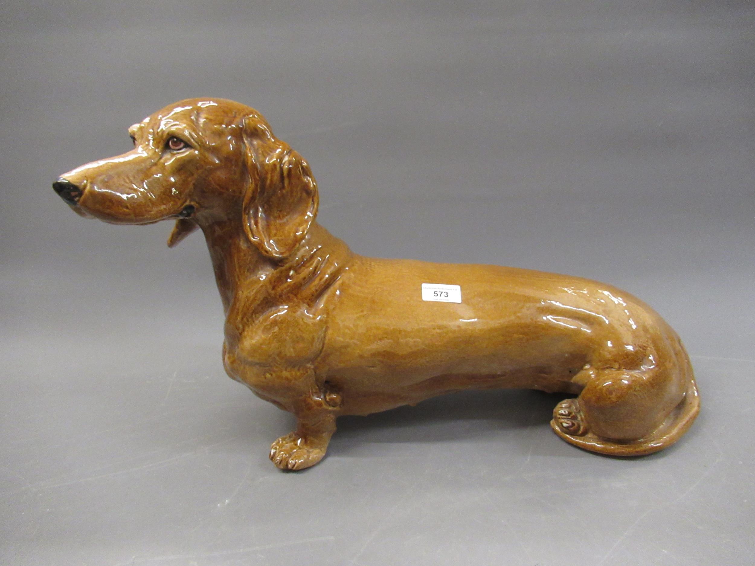 Life size Italian pottery figure of a Dachshund, 55cms long approximately