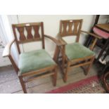 Pair of Arts & Crafts elm elbow chairs with triple splat backs, drop in seats and square moulded