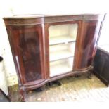 Edwardian mahogany semi bow fronted display cabinet with central glazed door flanked by two flush