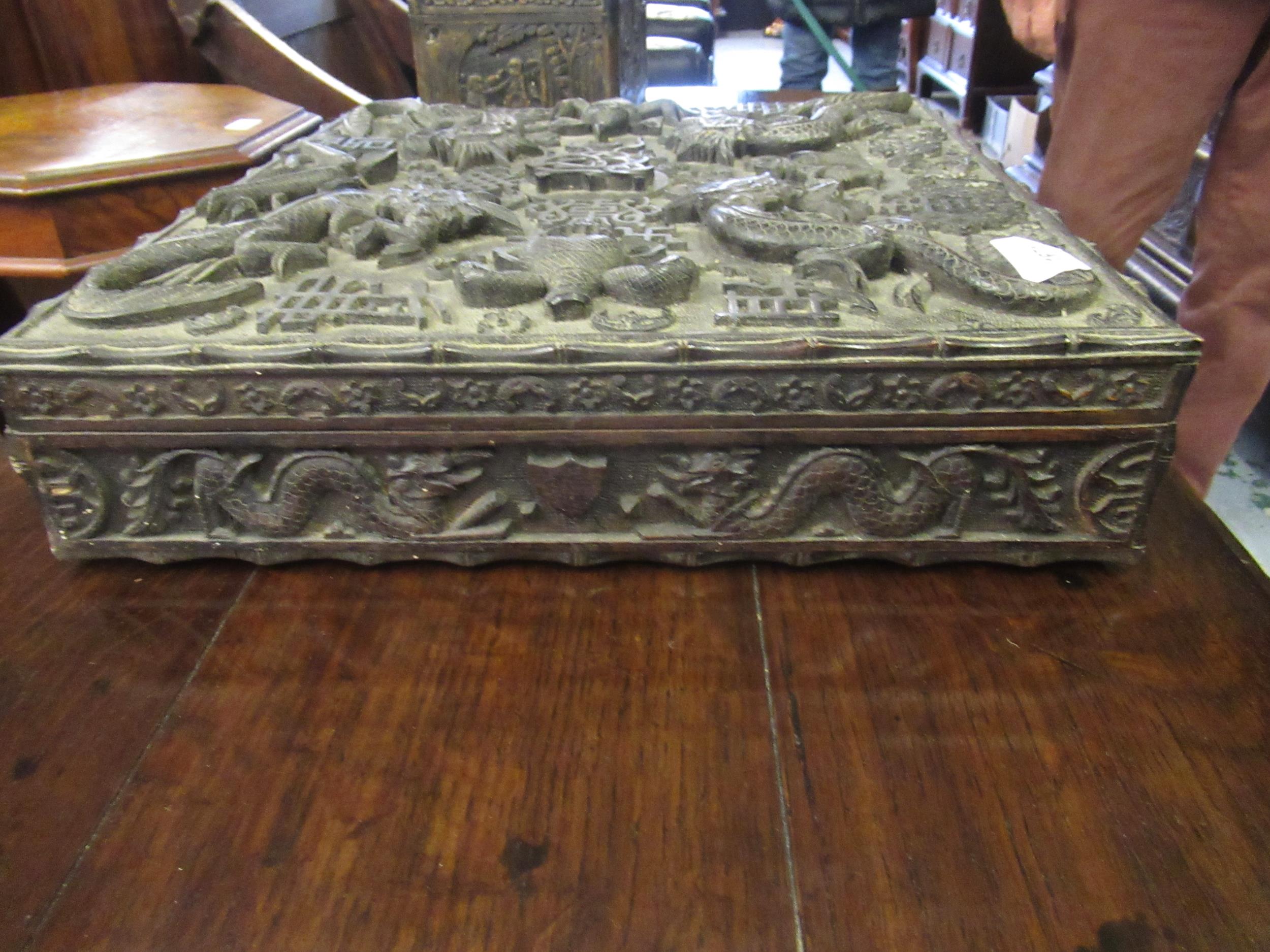 19th Century Chinese hardwood square box, all-over carved with dragons and other motifs, 38cms - Image 4 of 8