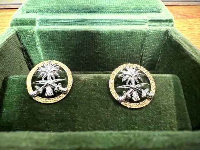 Pair of 18ct yellow and white gold cufflinks, in the form of the National Emblem of Saudi Arabia,