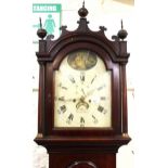 George III mahogany longcase clock, with an arched hood above an arched door, the enamel dial with