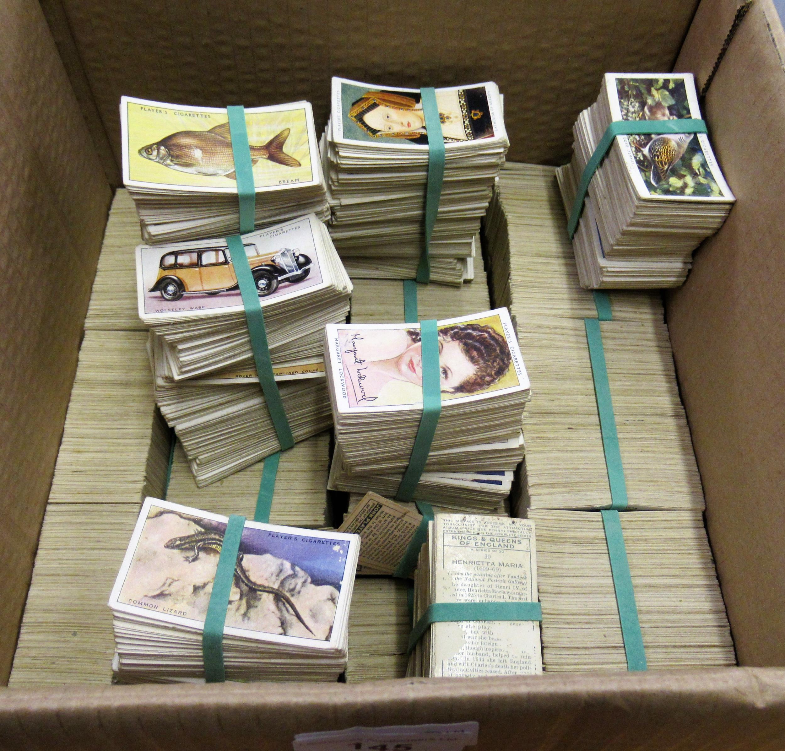 Box containing a large quantity of over twelve thousand pre-war Players adhesive cigarette cards,