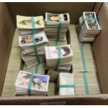 Box containing a large quantity of over twelve thousand pre-war Players adhesive cigarette cards,