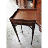 Small reproduction mahogany kettle stand, the galleried top above a pull-out slide on slender square