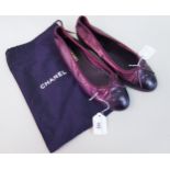 Pair of ladies Chanel burgundy and black leather ballerina flats, size 40, together with one dust