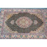 Small Indo Persian rug with a lobed medallion and all-over Herati design on a moss green ground with